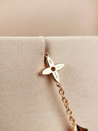 DIANA STAR AND SUN 7 MOTIFS GOLD BRACELET